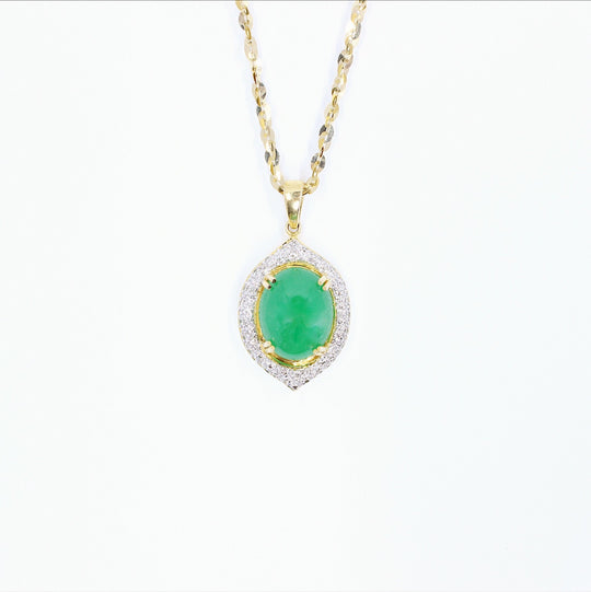 Silver gemstone pendant from JewelCreationsNY featuring a polished charm with intricate detailing.