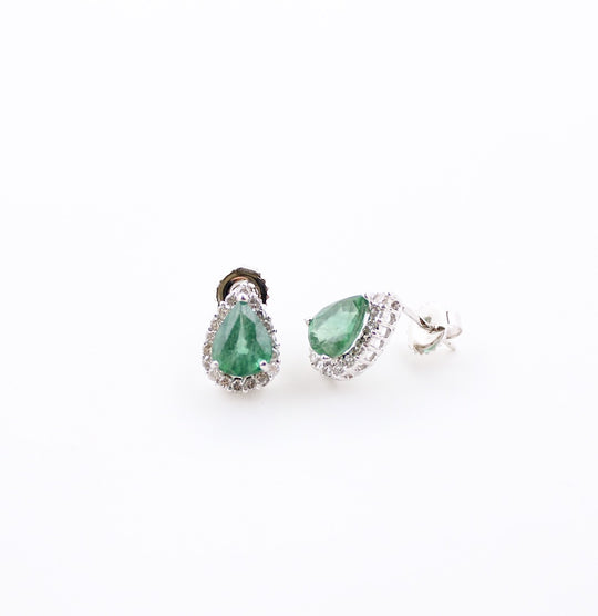 JewelCreationsNY earrings featuring elegant silver hoops with intricate gemstone detailing, displayed on a neutral background.